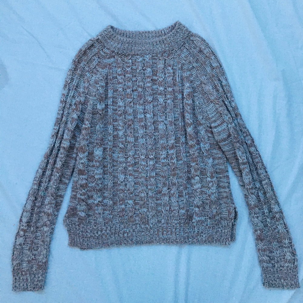 Tan knit sweater.
